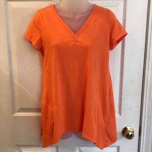 Logo by Lori Goldstein XS soft orange shark bite top with pockets EUC